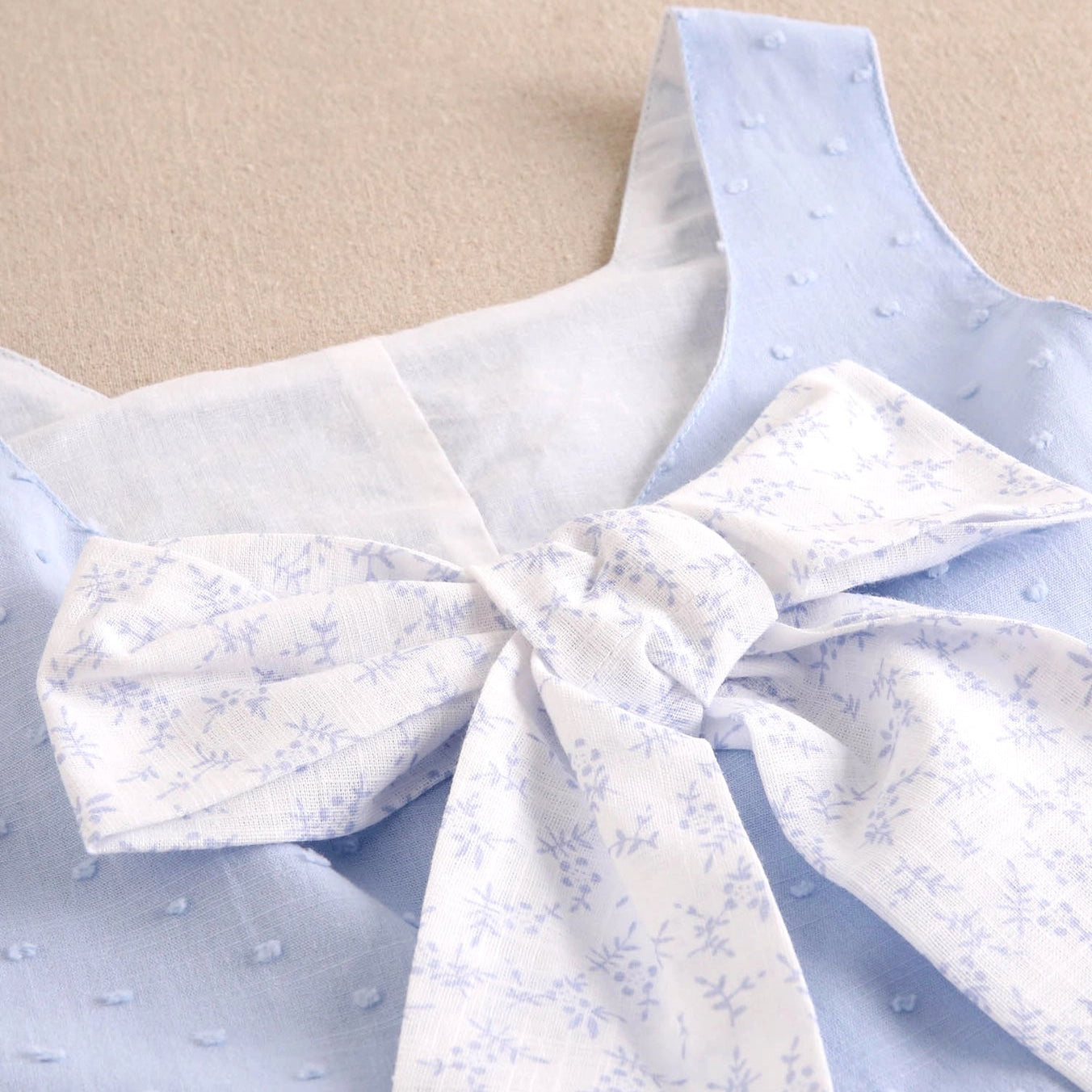 Blue Plumeti Girl's Romper with Maxi Bow