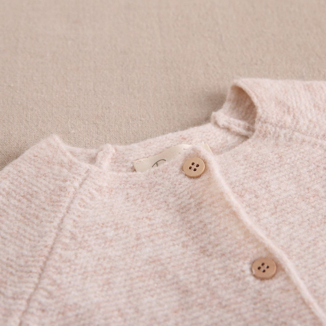 Beige knitted cardigan