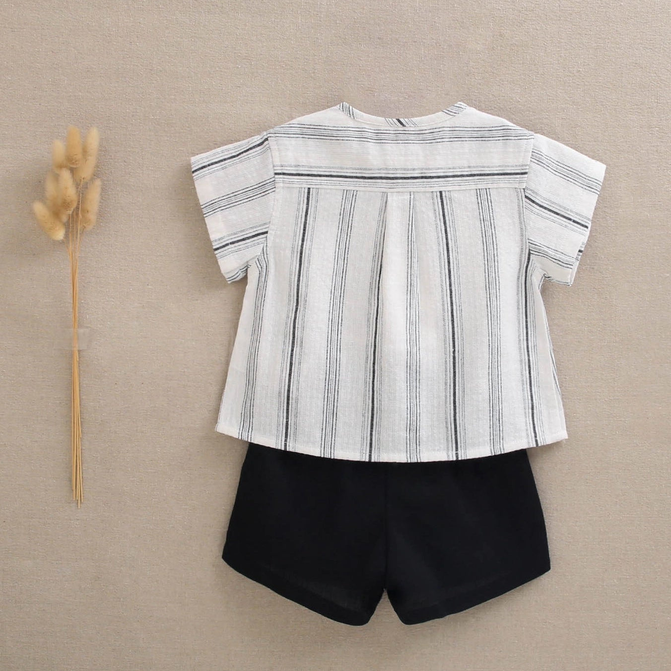 Baby Boy Set with A Two-Tone Shirt and Black Shorts